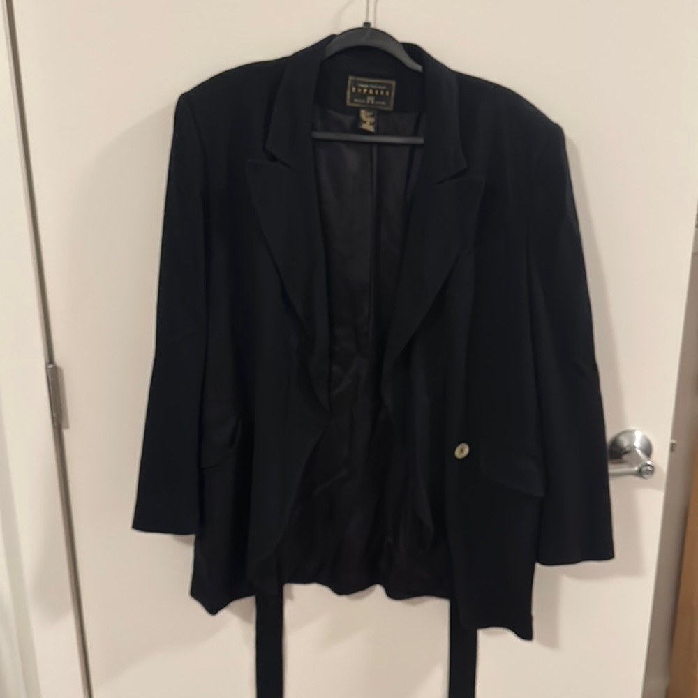 Gently used navy blazer.